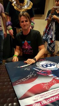 Justin Duke (Mitka) signing the FSOE Banner
